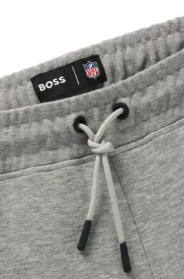 BOSS x NFL signature-tape tracksuit bottoms with special branding, Cowboys