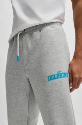 Pantalones de ch&aacute;ndal BOSS x NFL con cinta y detalles especiales de la marca, Dolphins