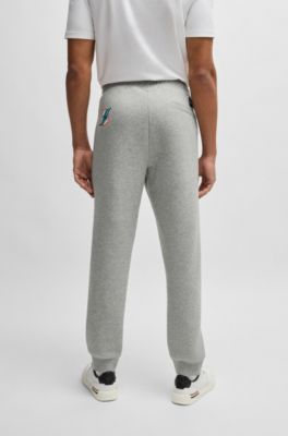 Pantalones de ch&aacute;ndal BOSS x NFL con cinta y detalles especiales de la marca, Dolphins