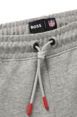 Pantalones de ch&aacute;ndal BOSS x NFL con cinta y detalles especiales de la marca, 49ers