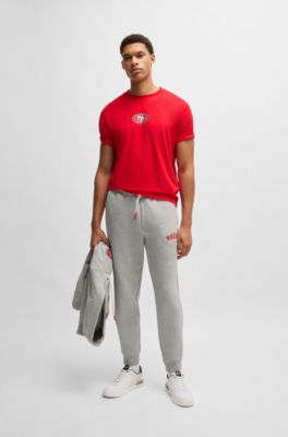 Pantalones de ch&aacute;ndal BOSS x NFL con cinta y detalles especiales de la marca, 49ers