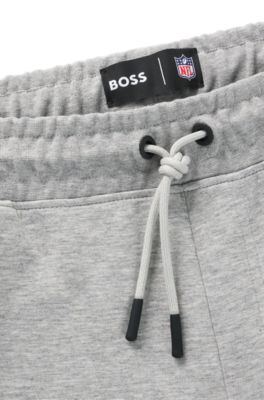 Pantalones de ch&aacute;ndal BOSS x NFL con cinta y detalles especiales de la marca, Eagles