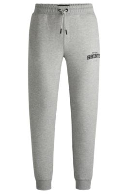 Pantalones de ch&aacute;ndal BOSS x NFL con cinta y detalles especiales de la marca, Saints
