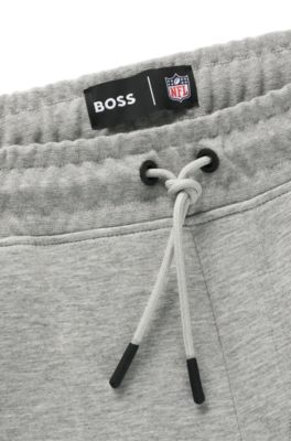 BOSS x NFL signature-tape tracksuit bottoms with special branding, Saints