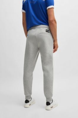 Pantalones de ch&aacute;ndal BOSS x NFL con cinta y detalles especiales de la marca, Rams