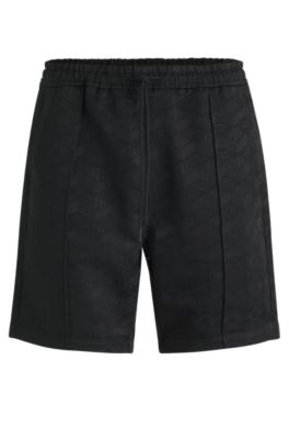 HUGO - Relaxed-fit shorts with geometric logos - Black
