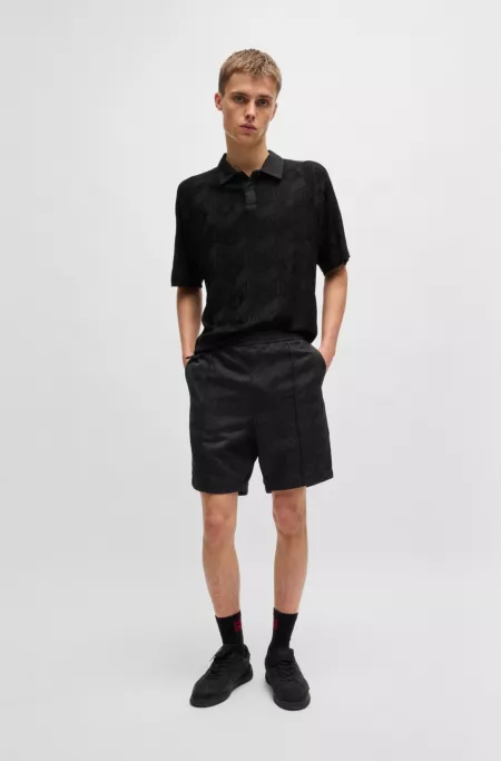 Relaxed-fit shorts with geometric logos