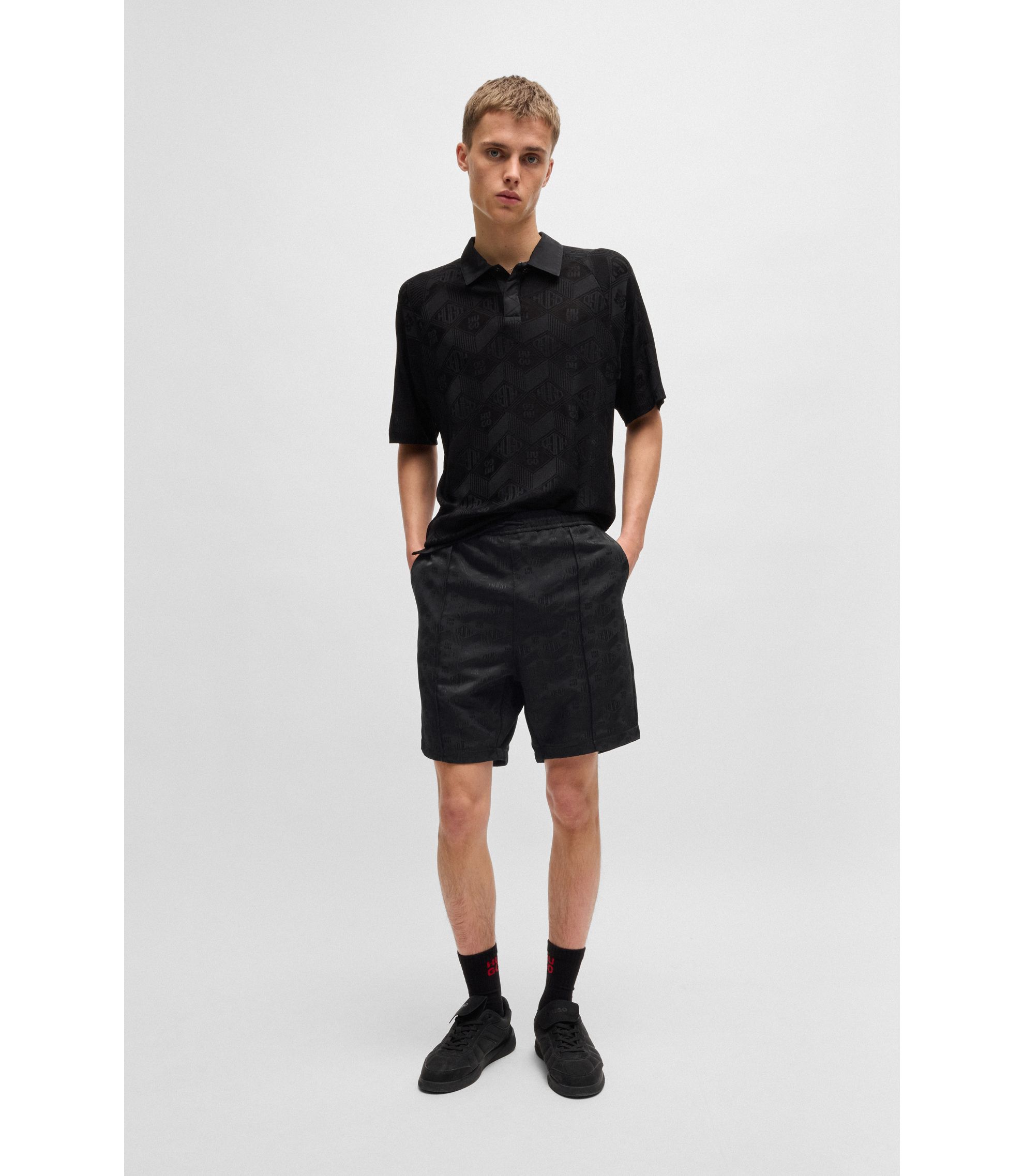 HUGO - Relaxed-fit shorts with geometric logos - Black