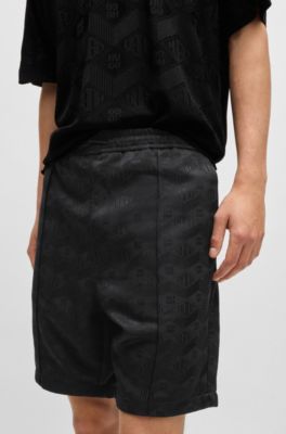 Relaxed-fit shorts with geometric logos, Black