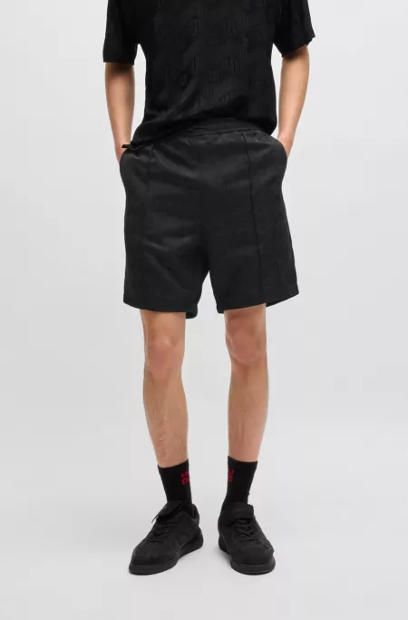 Relaxed-fit shorts with geometric logos