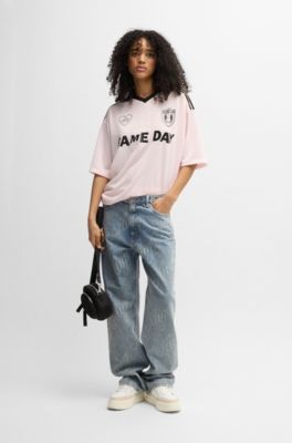 Jeans de corte recto en denim azul con logos estampados, Azul