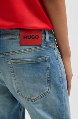 Jeans slim fit de denim el&aacute;stico en azul medio, Turquesa