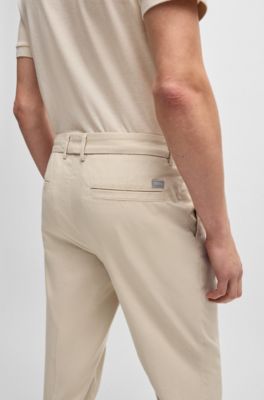 Pantalones regular fit de algod&oacute;n el&aacute;stico con microestampado, Beige claro
