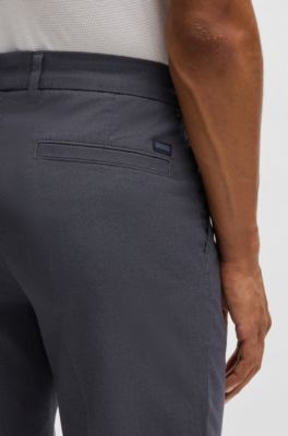 Pantalones regular fit de algod&oacute;n el&aacute;stico con microestampado, Azul oscuro