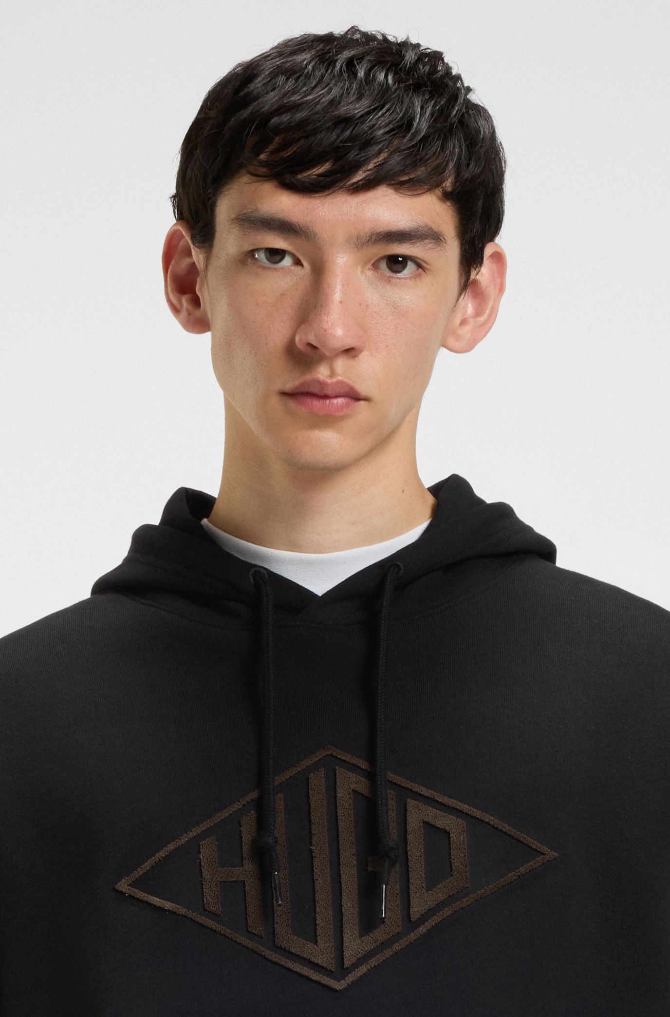 HUGO - Cotton-terry hoodie with embroidered logo - Black