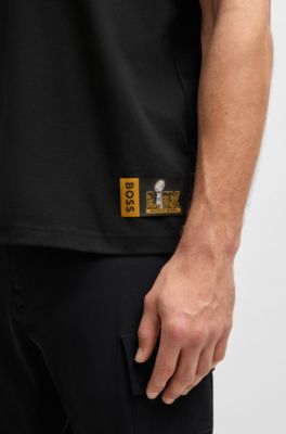 Camiseta BOSS x NFL de algod&oacute;n el&aacute;stico con ilustraci&oacute;n dorada, Negro