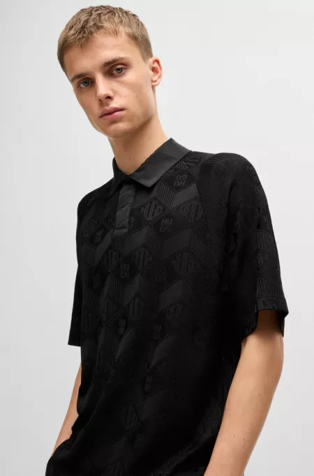 Logo-pattern polo shirt with contrast placket