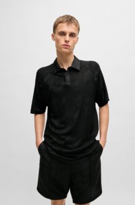 Polo &agrave; motif logot&eacute; avec patte de boutonnage contrastante, Noir