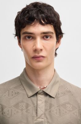 Polo &agrave; motif logot&eacute; avec patte de boutonnage contrastante, Marron