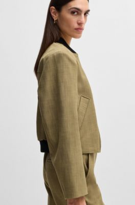 Chaqueta relaxed fit de tejido el&aacute;stico con motivo de espiga, Verde