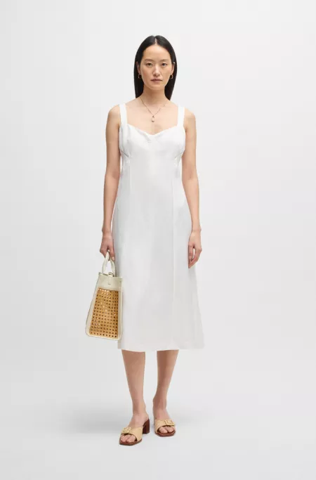 Summery dress with wide straps and seaming detail