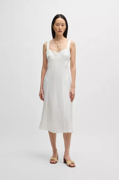 Summery dress with wide straps and seaming detail