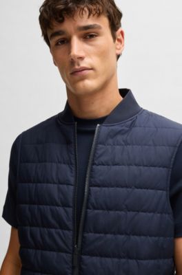 Travel-friendly stretch-softshell coat with detachable inner gilet