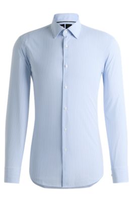 Camisa slim fit de tejido el&aacute;stico t&eacute;cnico a rayas, Celeste