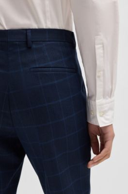 Pantalones de traje extra slim fit de pa&ntilde;o el&aacute;stico t&eacute;cnico, Azul oscuro