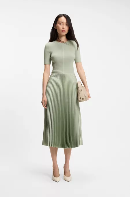Mixed-material dress with pleated skirt