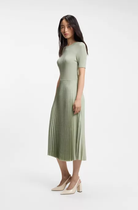 Mixed-material dress with pleated skirt