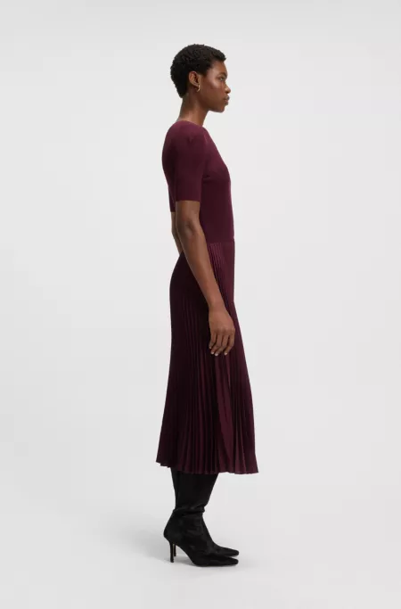 Mixed-material dress with pleated skirt