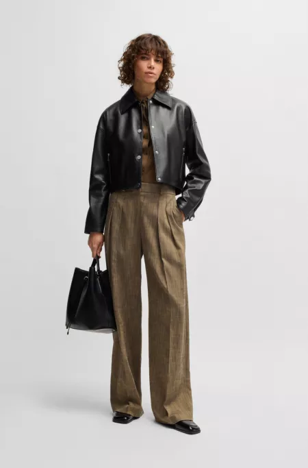 Leather jacket with covered press studs