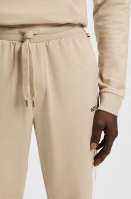 Pantalones de ch&aacute;ndal en felpa de algod&oacute;n con paneles laterales en contraste, Beige claro