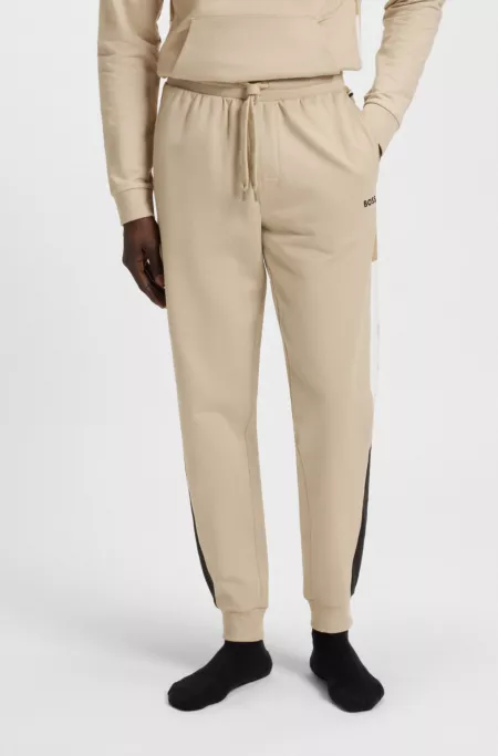 Cotton-terry tracksuit bottoms with contrast side panels