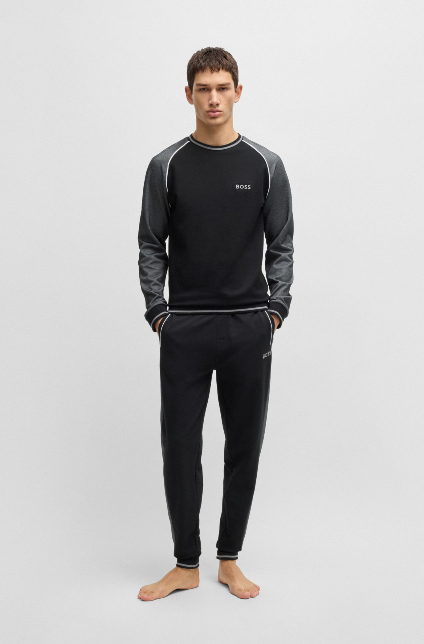 BOSS - Tracksuit bottoms with contrast piping - Black