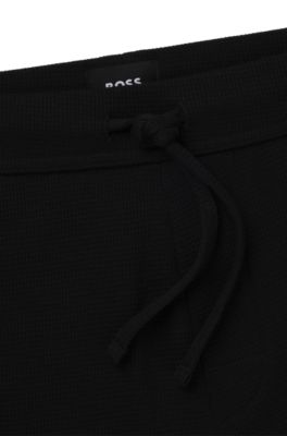Waffle-structure pyjama bottoms a cotton blend
