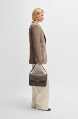 Grained faux-leather saddle bag with Double B monogram, Brown