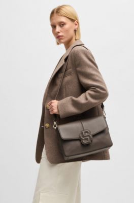 Grained faux-leather saddle bag with Double B monogram, Brown