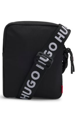 Reporter bag with branded adjustable strap and zip closure, Black