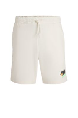 Cotton-terry shorts with Happy HUGO logo, White