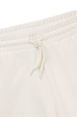 Cotton-terry shorts with Happy HUGO logo, White