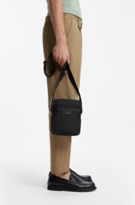 Structured reporter bag with signature trims, Black