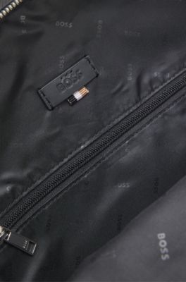 Mochila con varios bolsillos y apliques de piel, Negro