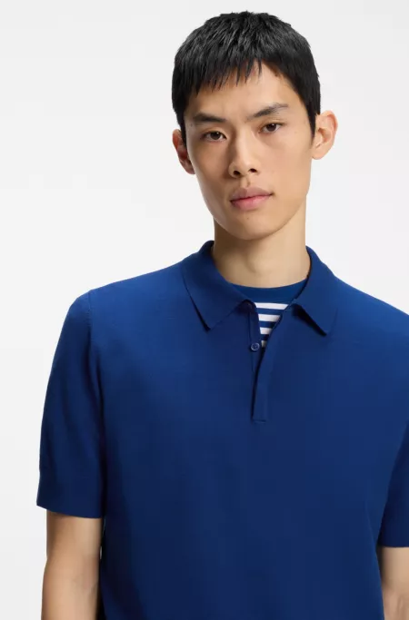 Knit polo sweater with covered placket