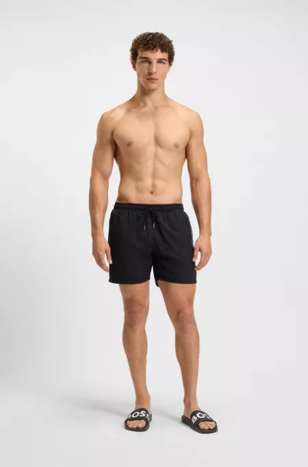 Italian-made slides with large logo detail