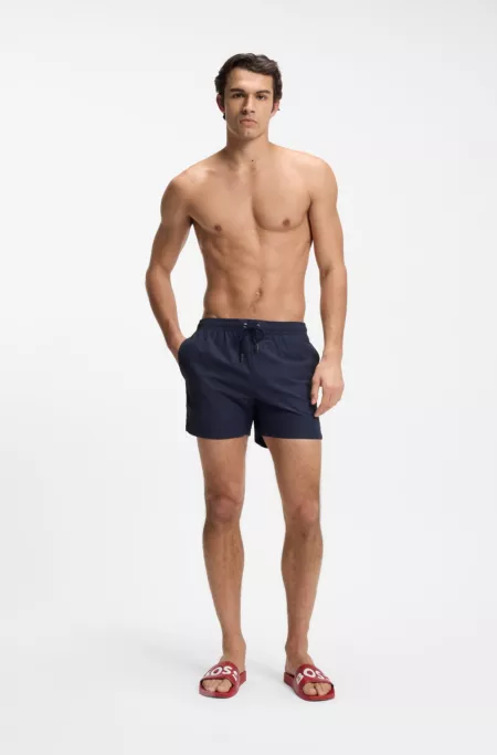 Italian-made slides with large logo detail