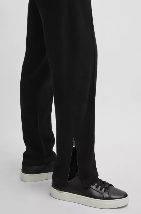 Regular-fit trousers in wool with zip hems
