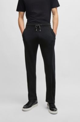 BOSS - Regular-fit trousers in wool with zip hems - Black