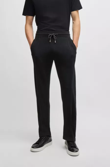 Regular-fit trousers in wool with zip hems